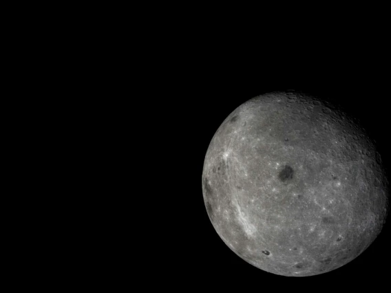 The far side of the moon, with distant Earth in the background, is visible in this photo taken by the Chang&#039;e 5-T1 mission. 